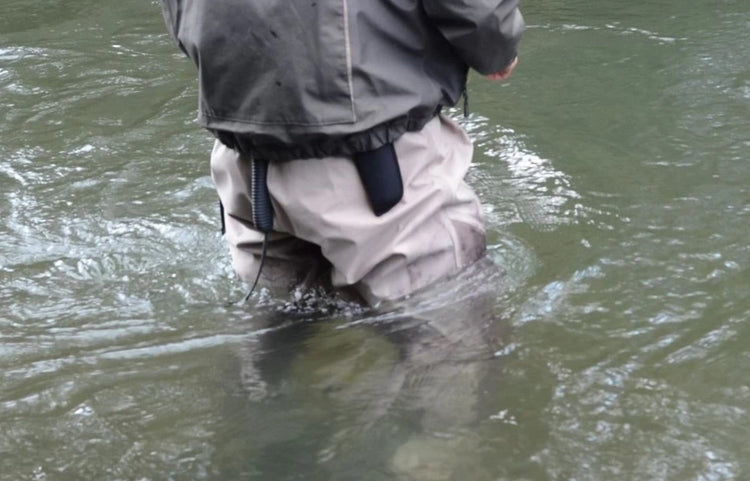 Standing in river wearing Stalker waders and wading jacket